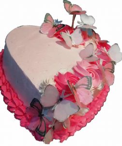 Pastel con mariposas y flores.